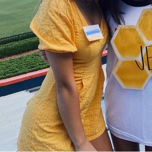 Yellow ASOS romper with tie back.